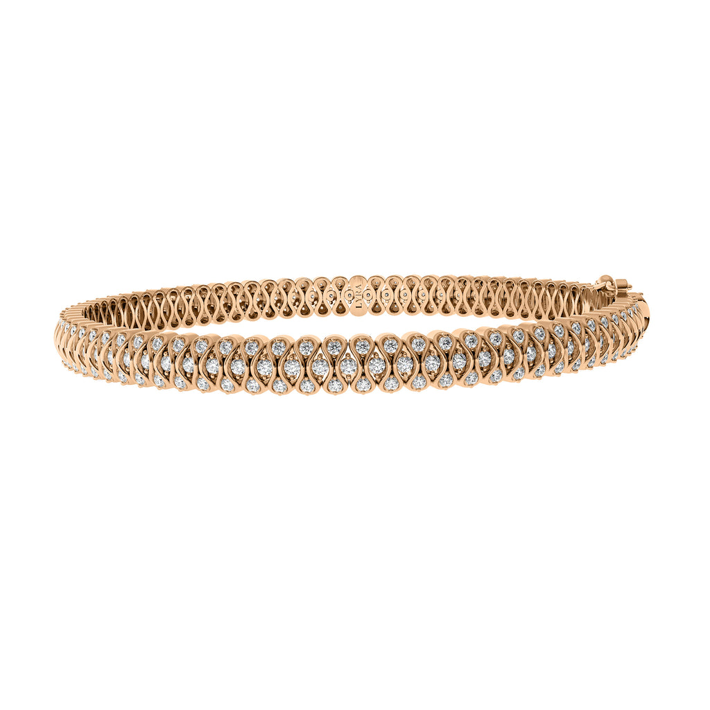 The Ginny Bracelet in solid 14k rose gold with lab-grown diamonds by Lyra Fine Jewelry.