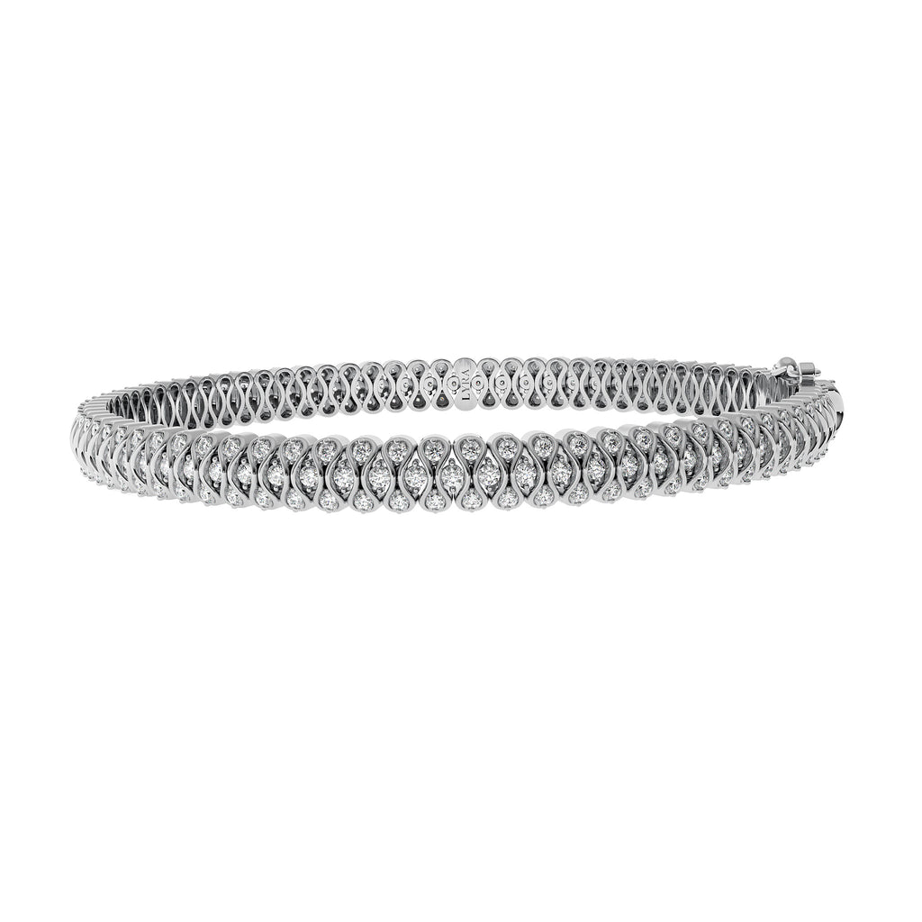 The Ginny Bracelet in solid 14k white gold with lab-grown diamonds by Lyra Fine Jewelry.