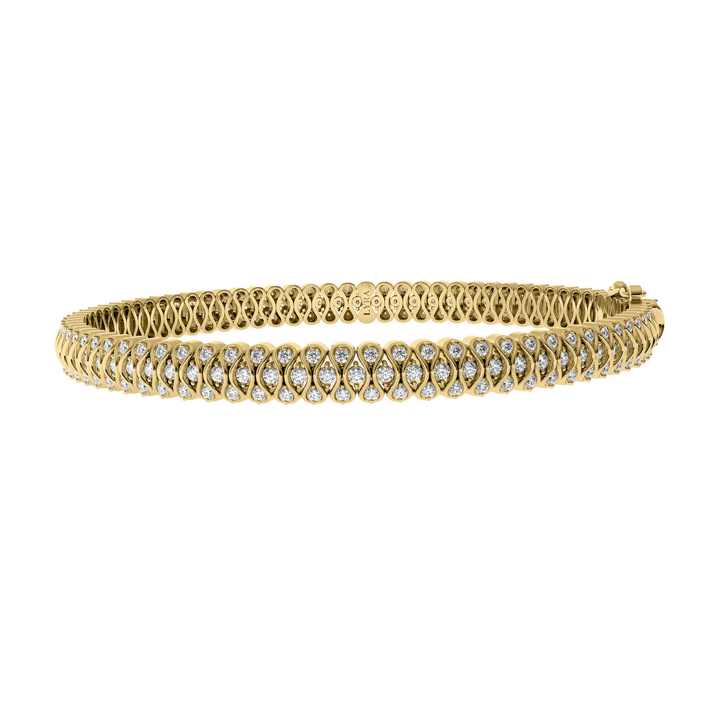 The Ginny Bracelet in solid 14k yellow gold with lab-grown diamonds by Lyra Fine Jewelry.