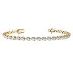 East-West pear lab diamond tennis bracelet in solid 14k gold