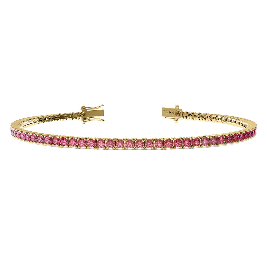 Ombré pink sapphire tennis bracelet in solid 14k gold